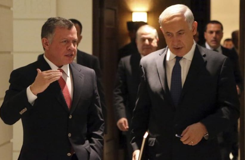 Jordan's King Abdullah walks with Prime Minister Benjamin Netanyahu (photo credit: REUTERS)