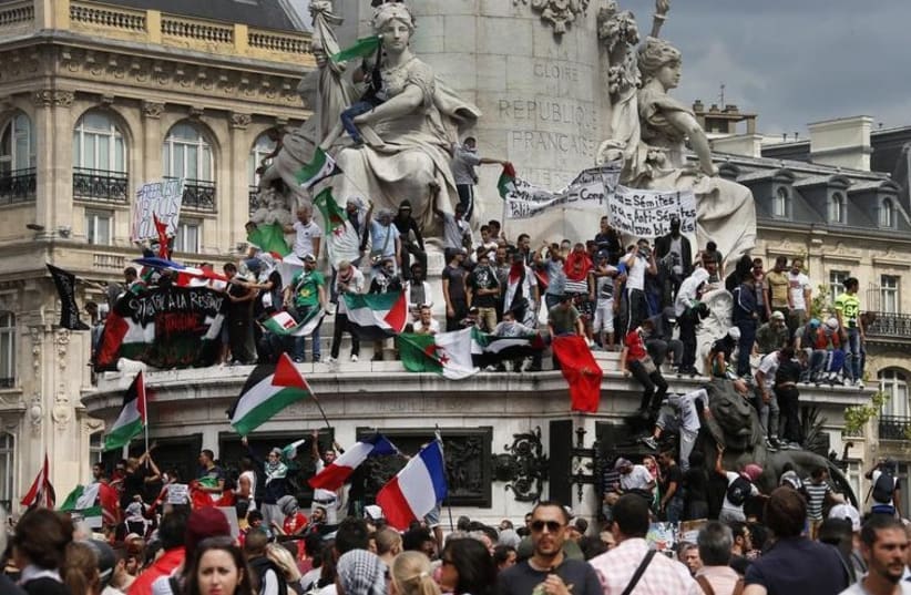 Parisians gather at Place de la Republique to support Gaza (photo credit: REUTERS)
