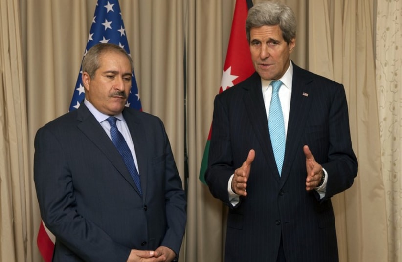 US Secretary of State John Kerry addresses the media alongside Jordanian Foreign Minister Nasser Judeh before the two held a bilateral meeting in Paris, France, on November 5, 2014. (photo credit: STATE DEPARTMENT PHOTO)