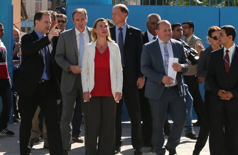  EU foreign policy chief Federica Mogherini (C) visits a UN-run school in Gaza. (photo credit: REUTERS)