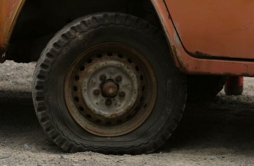 Flat tire (illustrative photo) (photo credit: INGIMAGE)