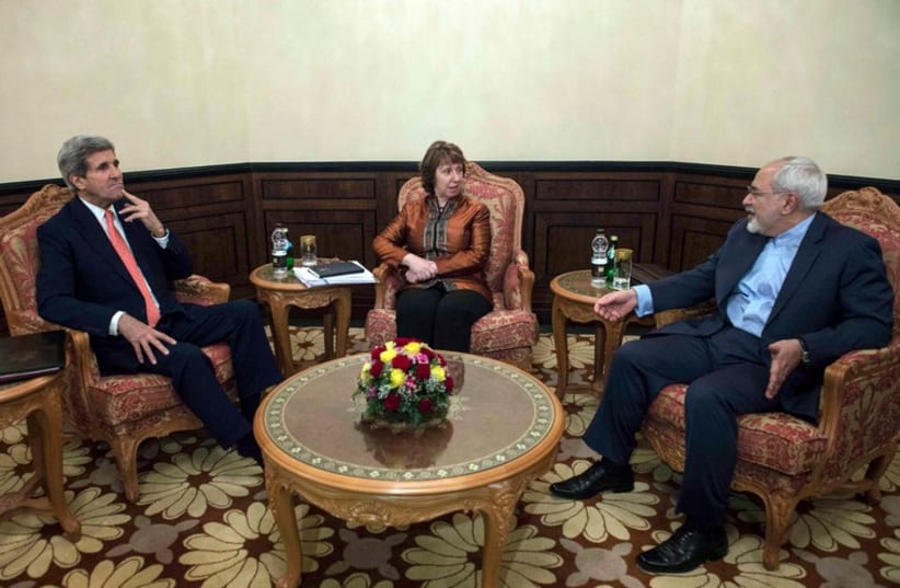 US Secretary of State John Kerry, EU envoy Catherine Ashton, Iranian Foreign Minister Mohammad Javad Zarif meet in Muscat November 10 (photo credit: REUTERS)