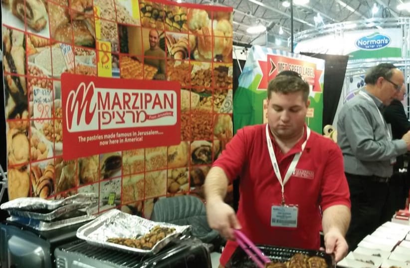 JERUSALEM’S OWN Marzipan bakery offers its iconic chocolate and cinnamon ‘rugelach’ at the annual Kosherfest trade show in New Jersey (photo credit: AMY SPIRO)