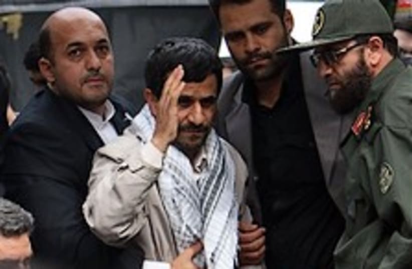 Ahmadinejad with bodyguards 224.88 ap (photo credit: AP)