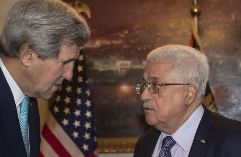 US Secretary of State Kerry meets with Palestinian President Abbas in Amman. (photo credit: REUTERS)