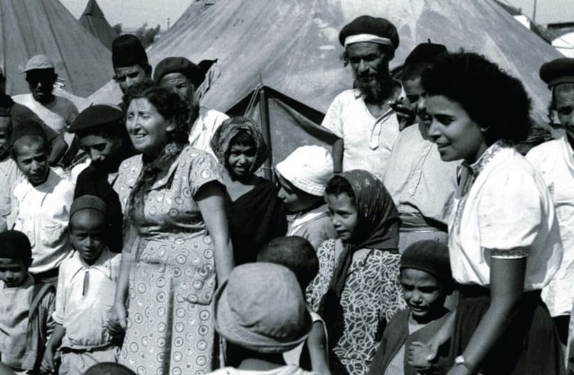 JEWISH IMMIGRANTS from Yemen in 1950 after their arrival to Israel (photo credit: REUTERS)