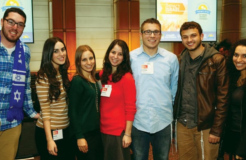 YOUNG PEOPLE attend an Impact Israel conference (photo credit: MARK VON HOLDEN)