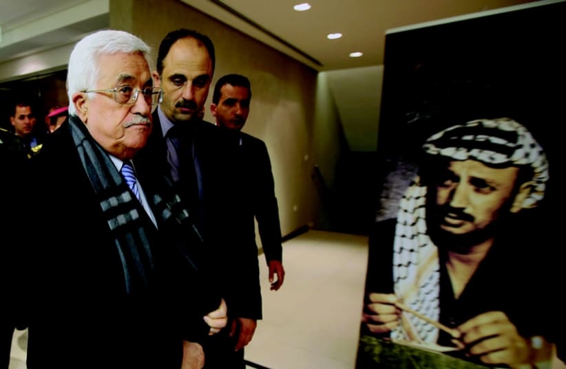 Mahmoud Abbas lors de la commemoration le 11 novembre (photo credit: REUTERS)