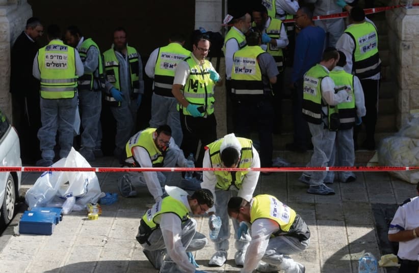Terror attack scene in Jerusalem  (photo credit: MARC ISRAEL SELLEM/THE JERUSALEM POST)