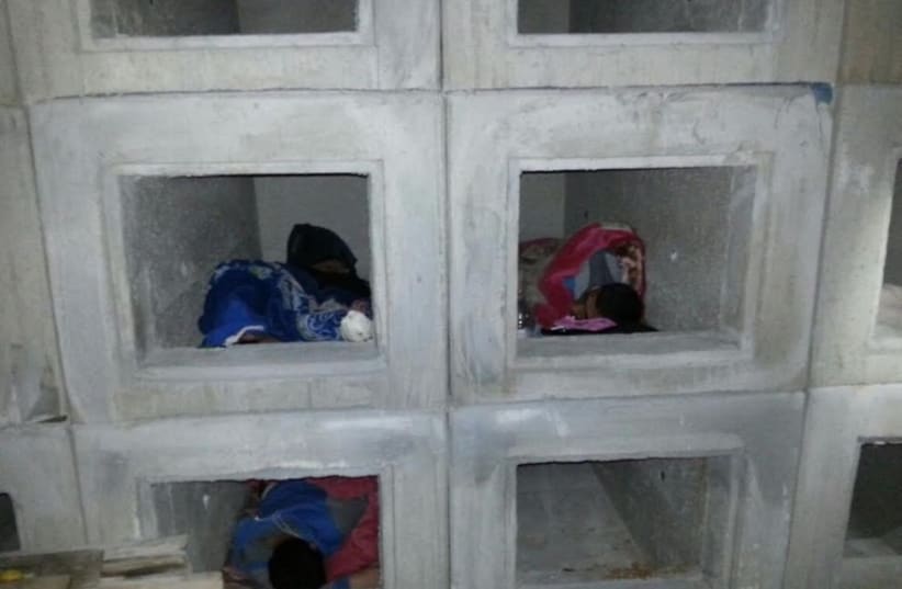 Palestinians found in cemetery, November 23 (photo credit: ISRAEL POLICE)