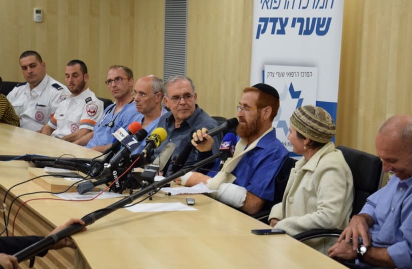 Yehudah Glick leaves hospital (photo credit: SHAARE ZEDEK MEDICAL CENTER)