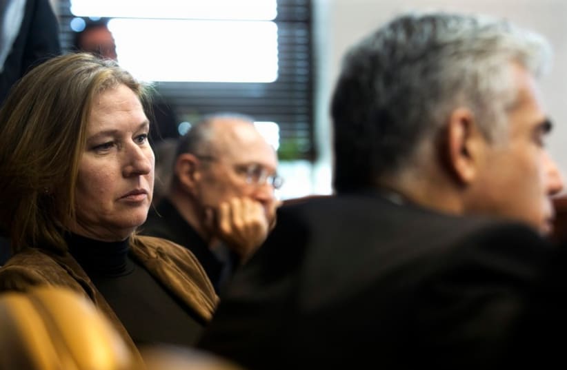 Justice Minister Livni, Finance Minister Lapid attend weekly cabinet meeting in Jerusalem (photo credit: REUTERS)