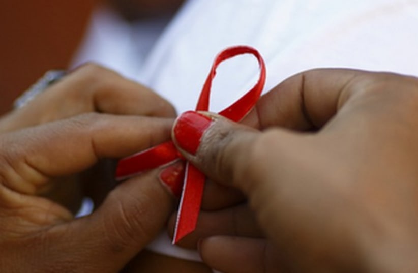 AIDS Ribbon (photo credit: REUTERS)