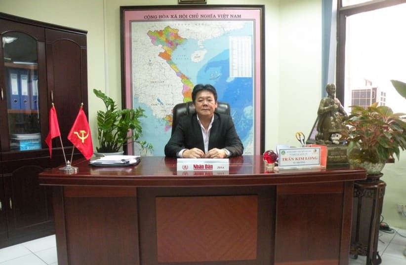 Tran Kim Long, director-general of the Vietnamese Agriculture and Rural Development Ministry's international cooperation department, at his office in Hanoi. (photo credit: SHARON UDASIN)