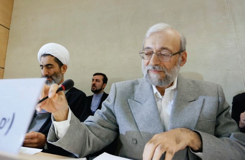 Mohammad Javad Larijani (front, right), secretary of Iran’s High Council for Human Rights (photo credit: REUTERS)