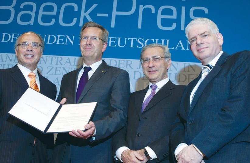  Josef Schuster (far right), with German President Christian Wulff (second from left) in 2011 (photo credit: THOMAS GOOD)