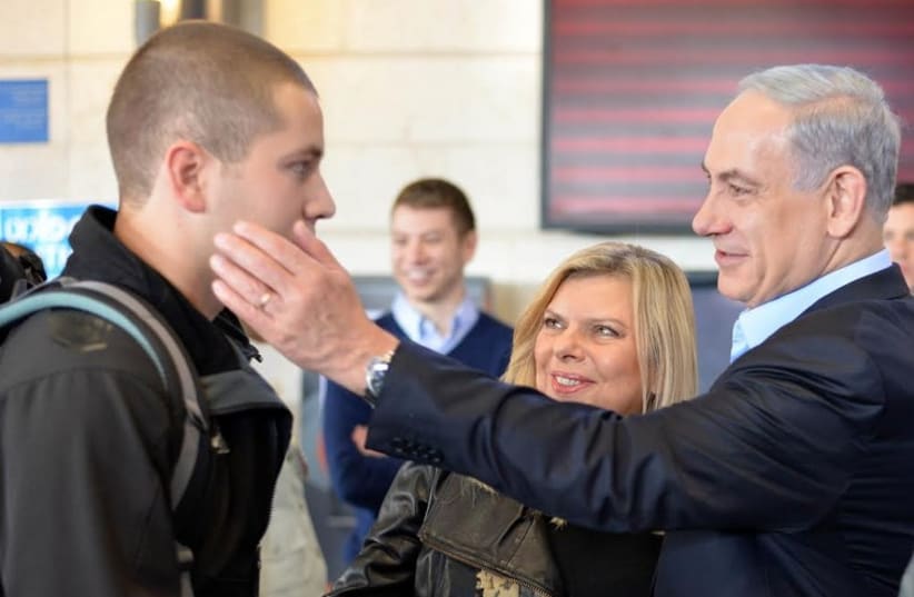 Prime Minister Benjamin Netanyahu sends off his son to the army (photo credit: GPO)