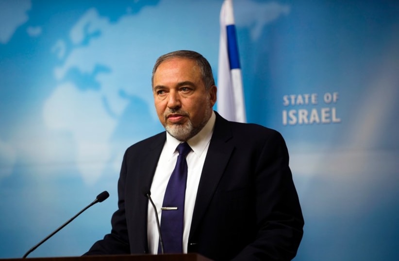 Foreign Minister Avigdor Liberman gives a statement to the media at his Jerusalem office December 2 (photo credit: REUTERS)