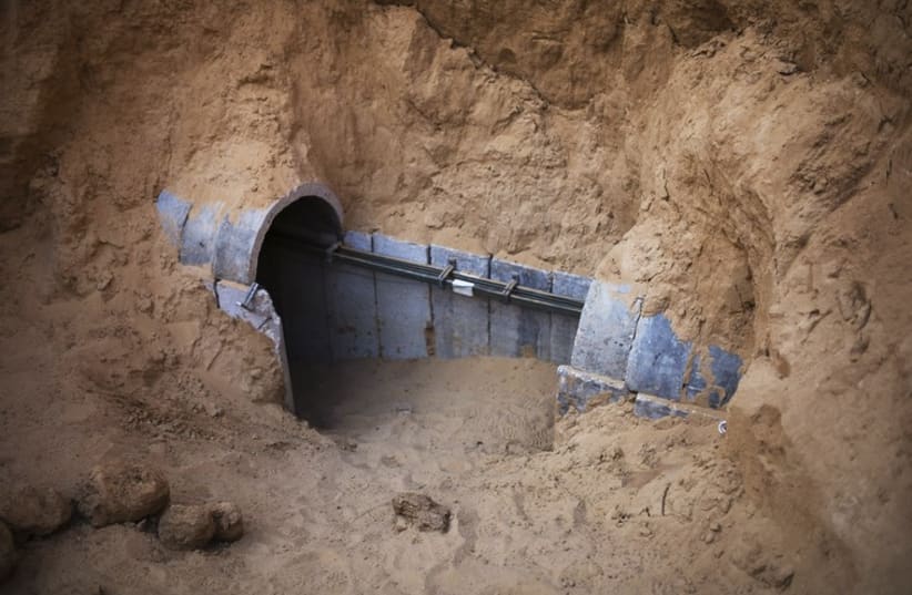 The entrance to a tunnel exposed by the Israeli military is seen on the Israeli side of the Israel-Gaza border (photo credit: REUTERS)