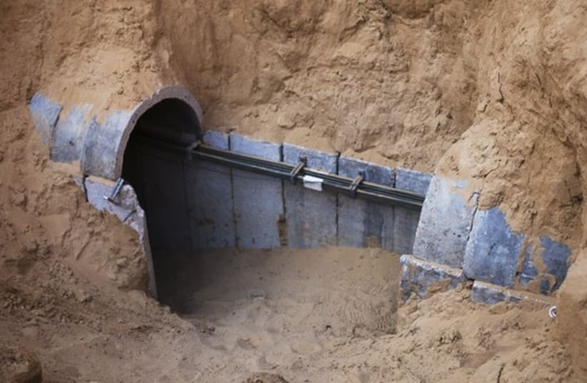 The entrance to a tunnel exposed by the Israeli military is seen on the Israeli side of the Israel-Gaza border (photo credit: REUTERS)