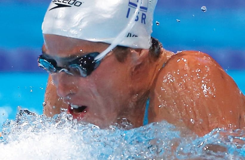 Israeli swimmer Amit Ivry reached the semifinals of the 50-meter breaststroke at the world short course swimming championships last night in Doha, Qatar, but came up short in her attempt to qualify for the final. (photo credit: REUTERS)