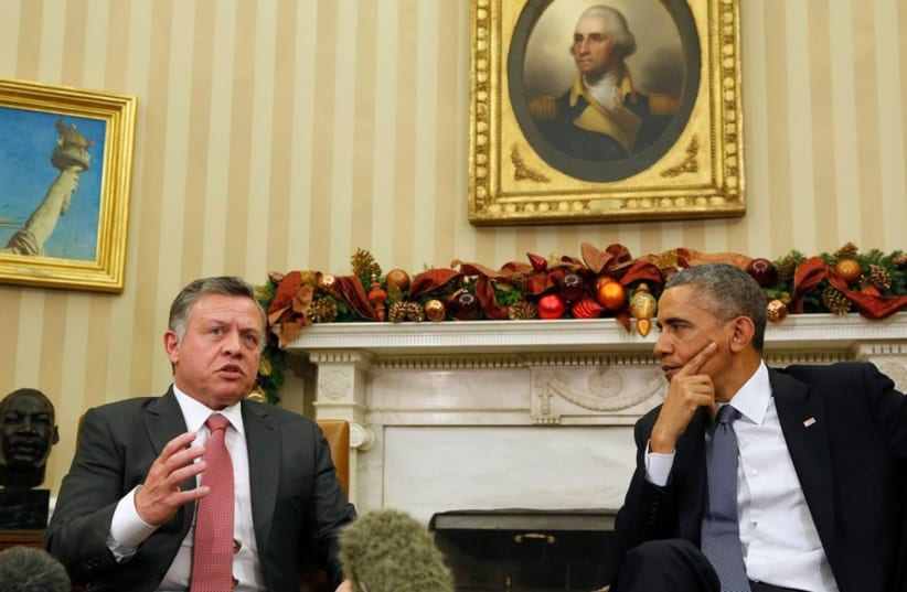 US President Barack Obama shakes hands with King Abdullah of Jordan in the White House, December 5, 2014. (photo credit: REUTERS)