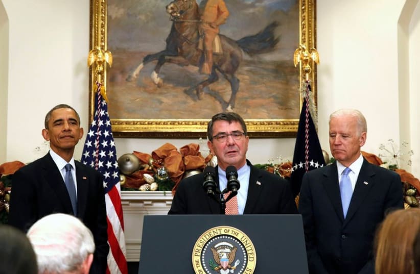 Ashton Carter (C), US President Barack Obama (L) and US Vice President Joseph Biden (R). (photo credit: REUTERS)