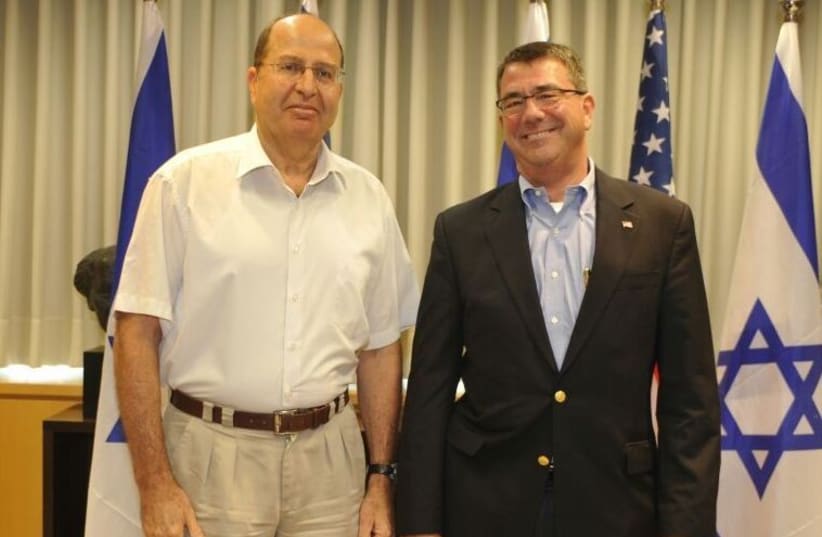 Defense Minister Moshe Ya'alon (L) and the man picked to head the Pentagon, Ashton Carter, meet in Jerusalem (photo credit: ARIEL HERMONI / DEFENSE MINISTRY)