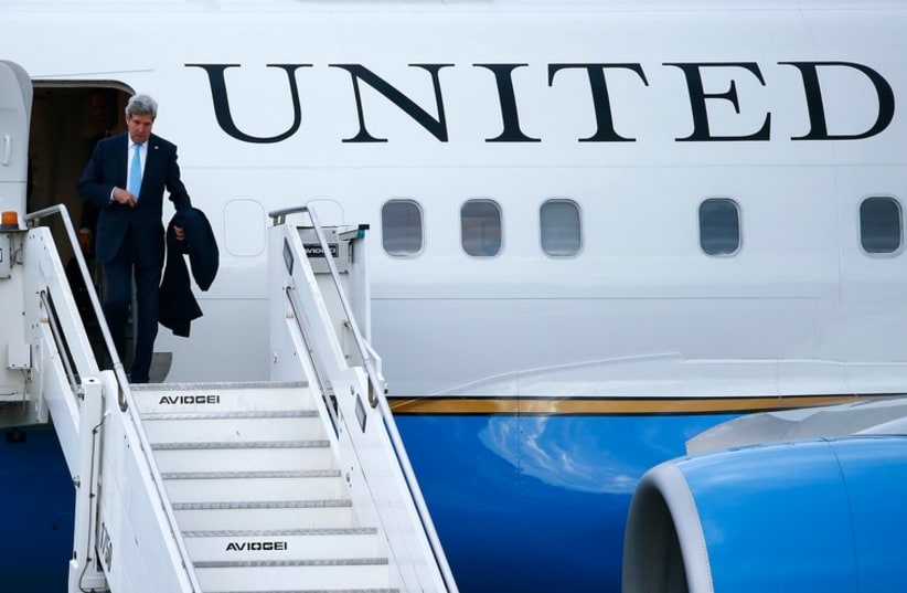 US Secretary of State John Kerry arrives at Ciampino military airport ahead of meeting with Prime Minister Benjamin Netanyahu in Rome December 14 (photo credit: REUTERS)