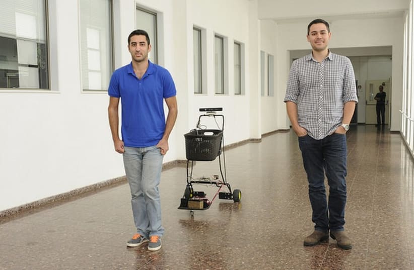  (L to R) Ohad Rusnak and Omri Elmalech with their tracking shopping cart (photo credit: SHARON TZUR, TECHNION)