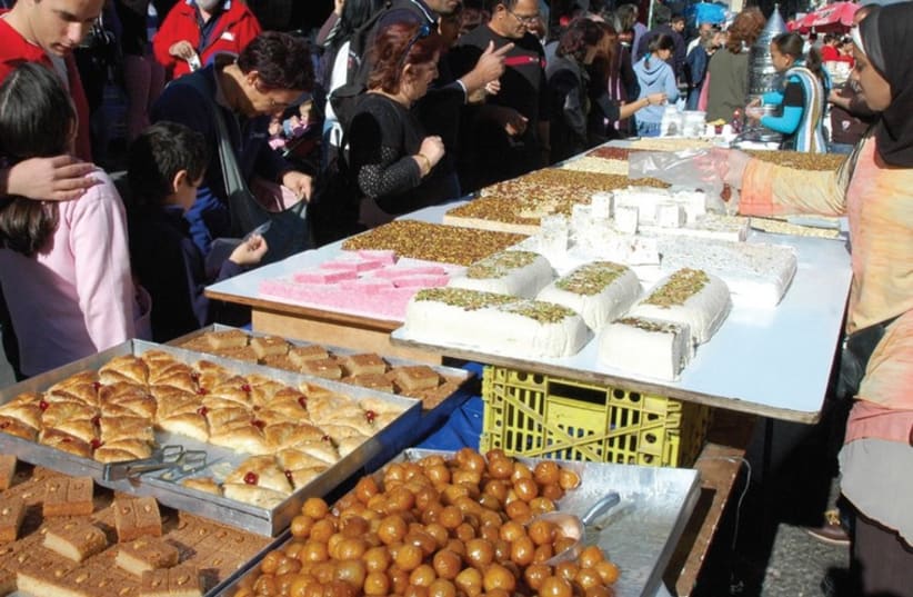 The sweets market in wadi Nisnas (photo credit: ZVI ROGER)