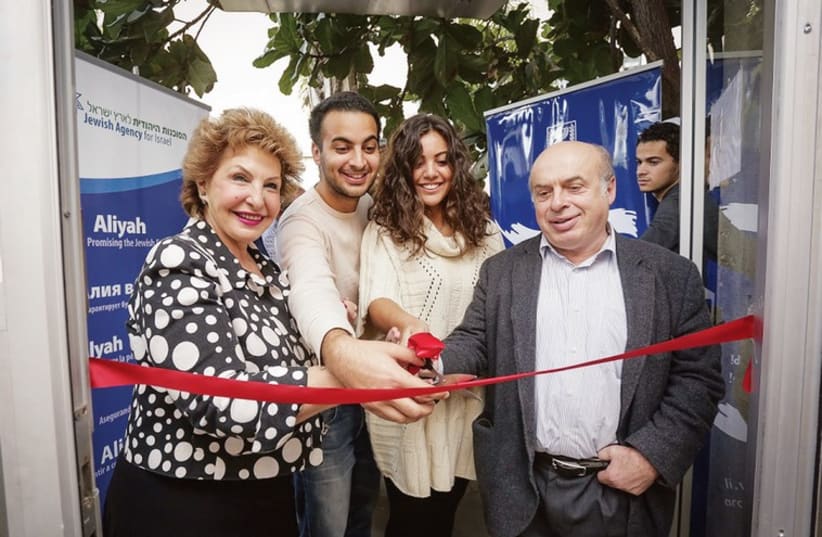 Jewish Agency chairman Natan Sharansky and Immigrant Absorption Minister Sofa Landver join young immigrants from around the world in dedicating the Beit Brodetsky Center for Young Immigrants in Tel Aviv. (photo credit: ZED FILMS)