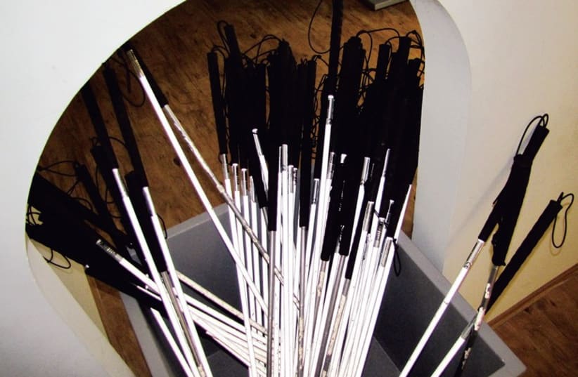 White canes aid those going through the 'Dialogue in the Dark’exhibit (photo credit: DAVID ZAGURI)