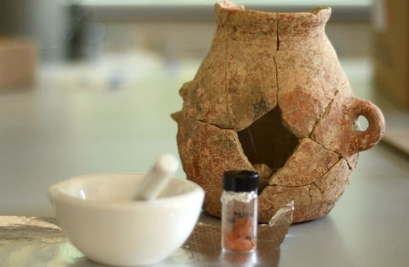 One of the 20 pottery relics found by the IAA in the Lower Galilee containing residue from 8,000-year-old olive oil. (photo credit: IAA)