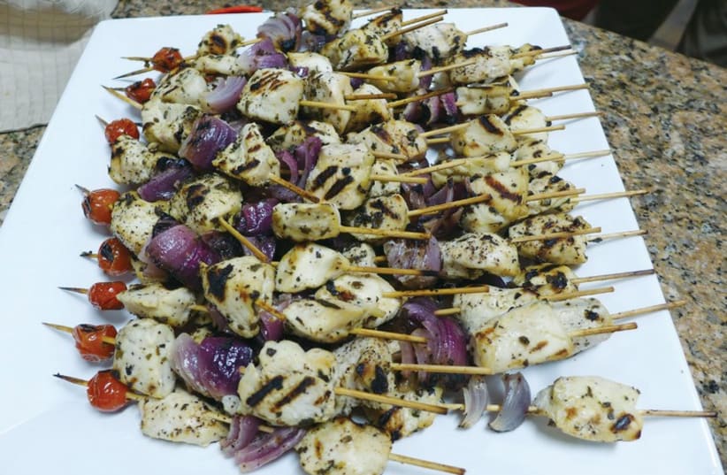 Marinated chicken kebabs. (photo credit: YAKIR LEVY)
