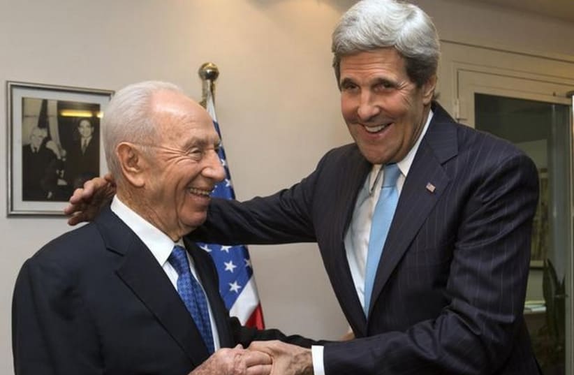 US Secretary of State John Kerry (R) meets former president Shimon Peres in Jerusalem (photo credit: REUTERS)