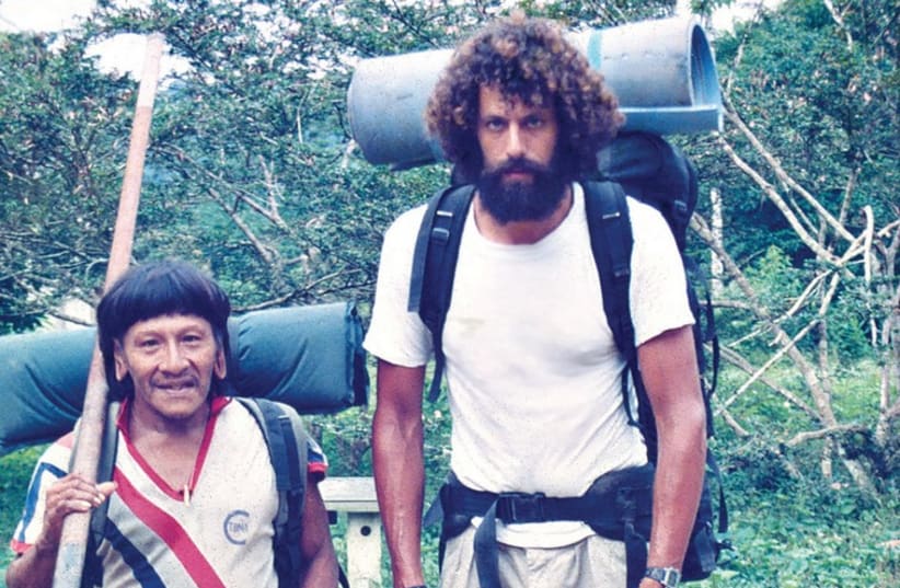 DR. DAN BOLOTIN as a young researcher in South America with a local shaman. (photo credit: Courtesy)