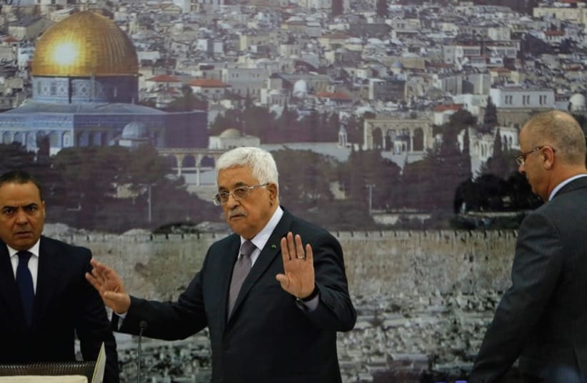 Palestinian Authority President Mahmoud Abbas gestures during a meeting in Ramallah (photo credit: REUTERS)