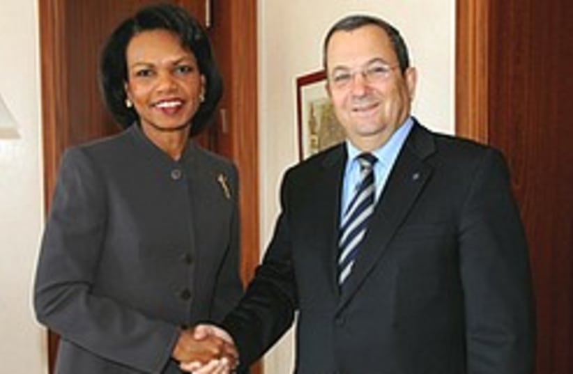 Rice and Barak shake hands 248.88 (photo credit: AP)