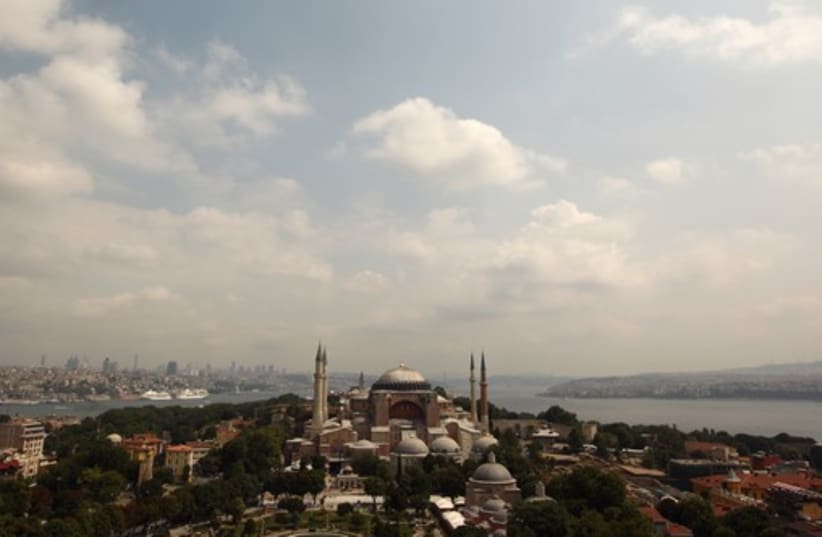 The Byzantine monument of Hagia Sofia (Ayasofya) is seen from the top of one of the minarets of the Sultanahmet mosque in Istanbul (photo credit: REUTERS)