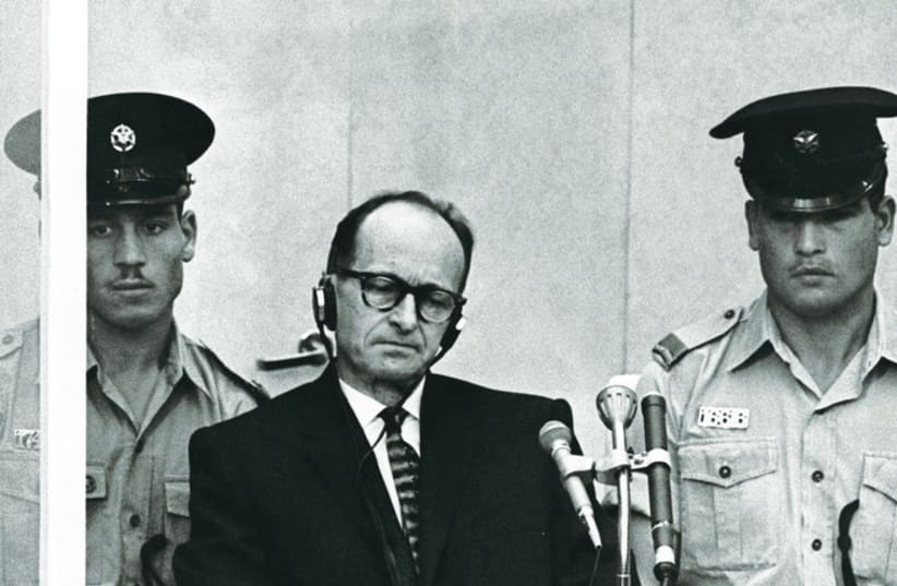 Adolf Eichmann sits during his trial in Jerusalem, 1961. (photo credit: REUTERS,REBECCA FRIEDMAN,REPUBBLICA CONFERENCE/PR)