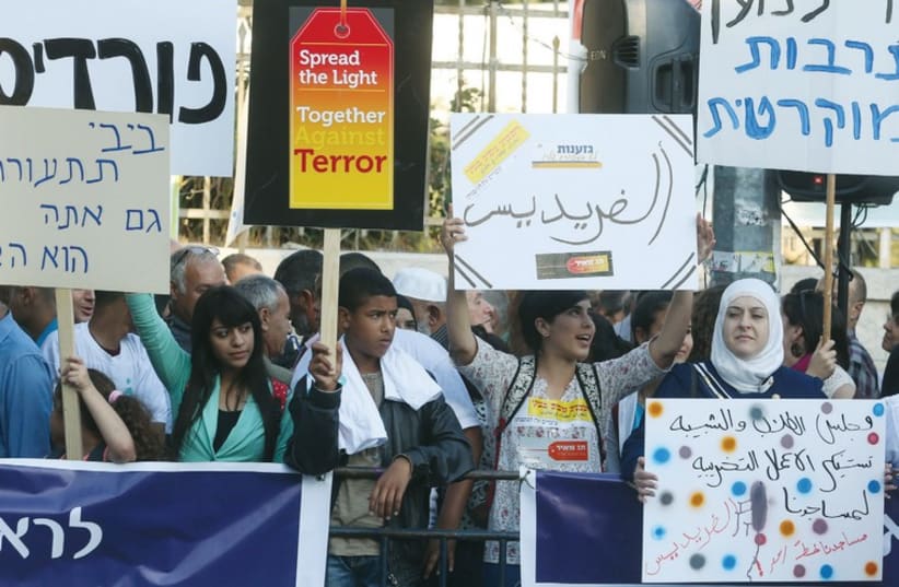 Demonstrators gather outside the Prime Minister’s Residence protesting against racist ‘Price Tag’ attacks in May, 2014. (photo credit: MARC ISRAEL SELLEM/THE JERUSALEM POST)