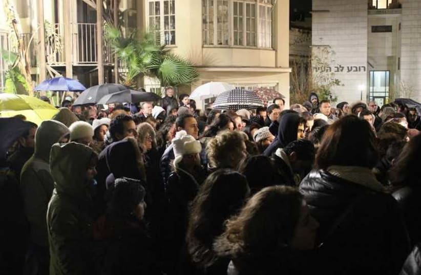 French Jews in Tel Aviv commemorate victims of Paris terror attacks  (photo credit: BEN HARTMAN)