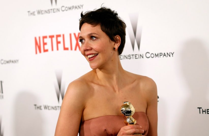 Actress Maggie Gyllenhaal arrives at the Weinstein Netflix after party after the 72nd annual Golden Globe Awards in Beverly Hills, California (photo credit: REUTERS)