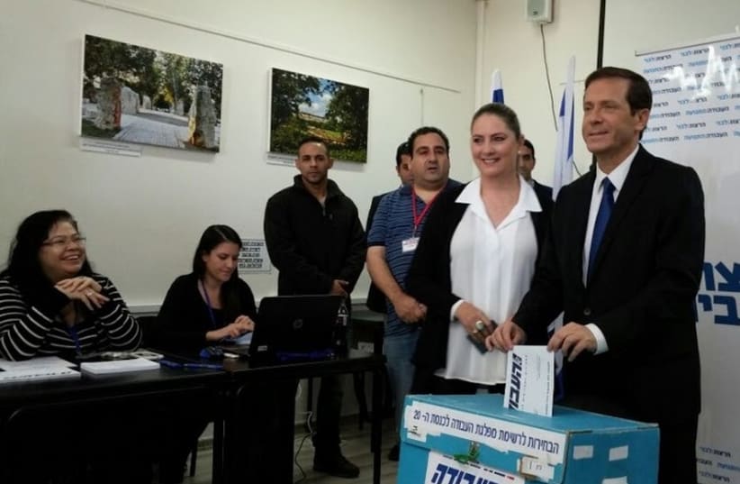 Labor Party leader Isaac Herzog casts his ballot in the primary (photo credit: COURTESY LABOR-HATNUA)