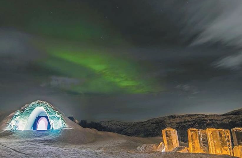 The Northern Lights above the Kirkenes Snow Hotel (photo credit: PR)