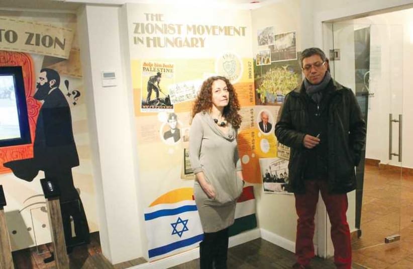 Vered Glickman  (left), director of the ICI, stands with co-chair Gabor Rona in the Herzl Center. (photo credit: BARRY DAVIS)