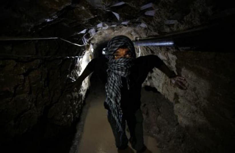 A smuggling tunnel beneath the Egyptian-Gaza border in Rafah [File] (photo credit: REUTERS)