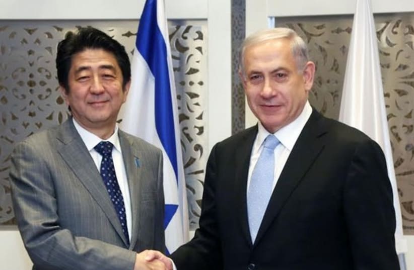 Visitn Japanese Prime Minister Shinzo Abe and Prime Minister Benjamin Netanyahu, January 18, 2015 (photo credit: MARC ISRAEL SELLEM/THE JERUSALEM POST)