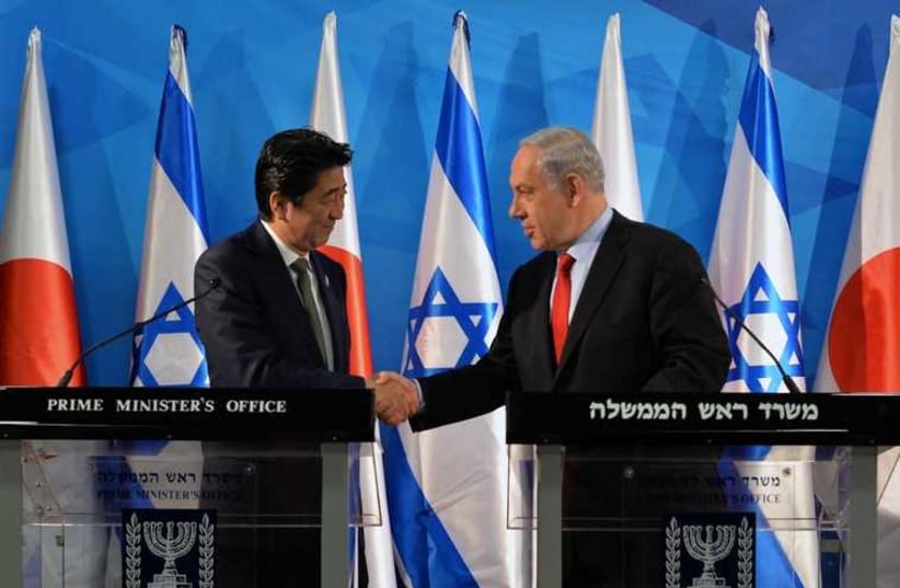 PM Netanyahu and PM of Japan Shinzo Abe‏ (photo credit: KOBI GIDEON/GPO)